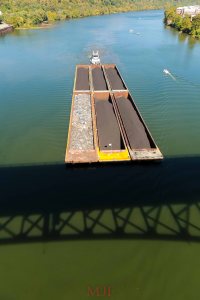A coal and scrap barge, a scene from times past 
